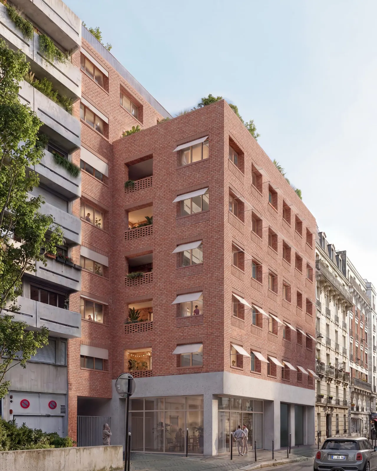 Façade en brique des Ateliers Dollfus depuis la rue Jean Dollfus